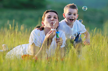 Image showing woman child bubble