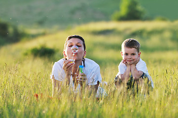 Image showing woman child bubble