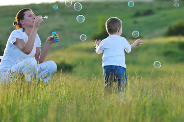 Image showing woman child bubble