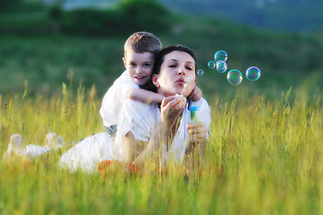 Image showing woman child bubble