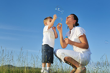 Image showing woman child bubble