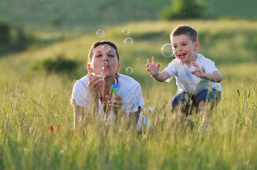 Image showing woman child bubble