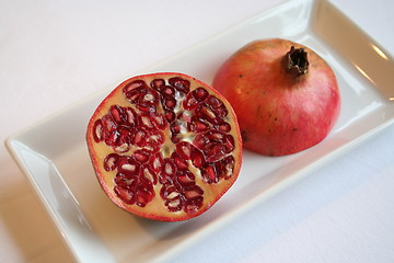 Image showing Pomegranate  on white plate