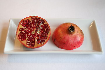 Image showing Pomegranate  on white plate