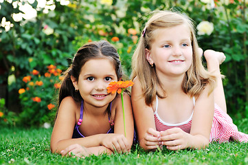 Image showing two happy girls have fun outdoor 