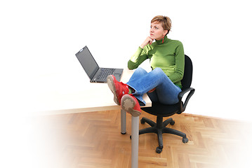 Image showing casual girl relaxing at the office