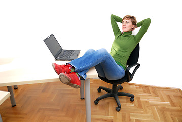 Image showing casual girl relaxing at the office