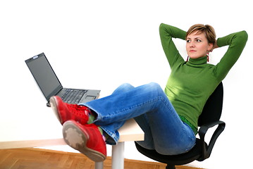 Image showing casual girl relaxing at the office