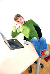 Image showing casual girl relaxing at the office