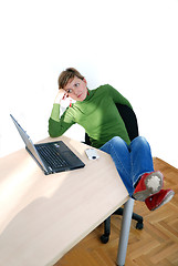 Image showing casual girl relaxing at the office