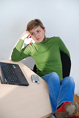 Image showing casual girl relaxing at the office