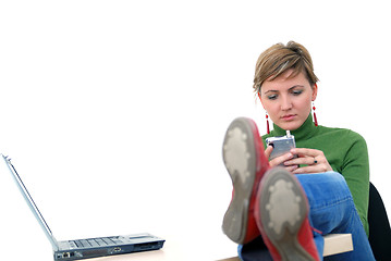 Image showing casual girl relaxing at the office