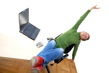 Image showing casual girl relaxing at the office