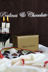 Image showing wine, chocolate and praline decoration 