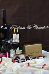 Image showing wine, chocolate and praline decoration 