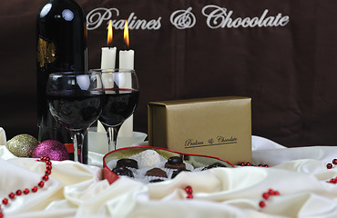 Image showing wine, chocolate and praline decoration 