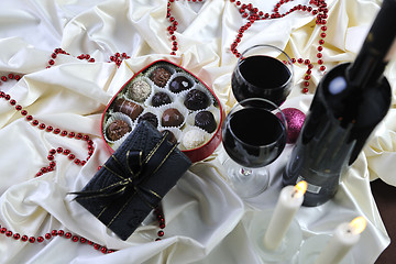 Image showing wine, chocolate and praline decoration 