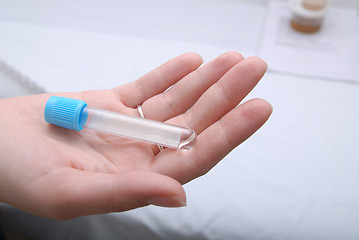 Image showing test-tube in woman hand