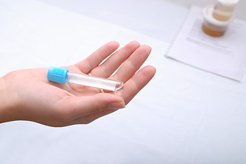 Image showing test-tube in woman hand