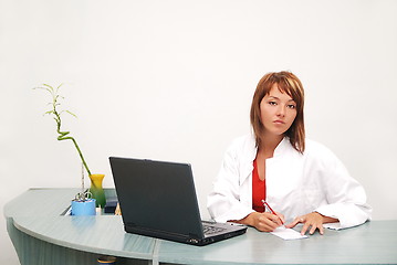 Image showing Smilling nurse with laptop