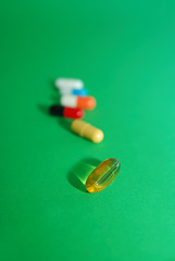Image showing pills on green background