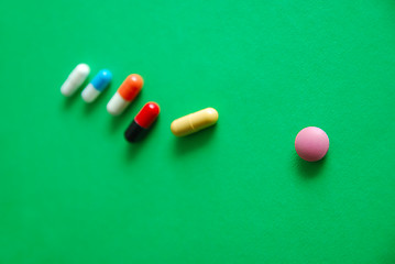 Image showing pills on green background