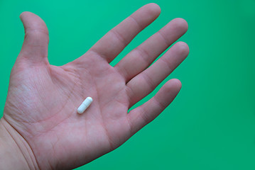 Image showing pills in hand