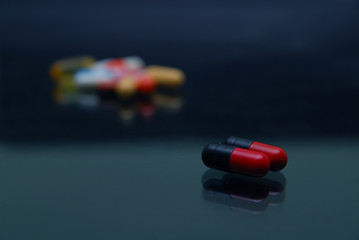 Image showing pills on glosy surface