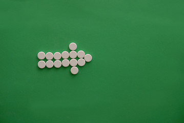 Image showing tablets in arrow formation