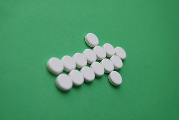 Image showing tablets in arrow formation