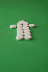 Image showing tablets in arrow formation