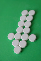 Image showing tablets in arrow formation