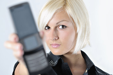 Image showing portrait of young blonde business woman holding new modern cellp