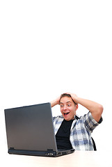 Image showing young man working on laptop