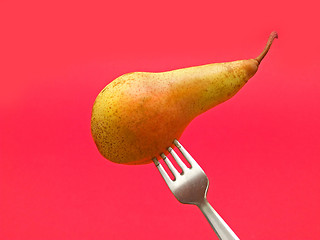 Image showing fresh pear on fork