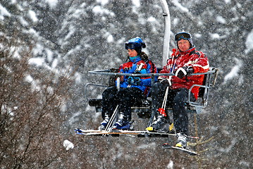 Image showing winter fun on a chair lift