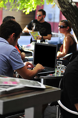 Image showing picture of handsome businessman on leisure with laptop