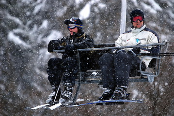 Image showing winter fun on a chair lift