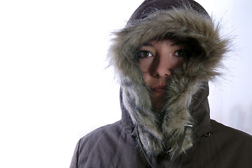 Image showing Cute young woman smiling in winter jacket