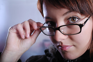 Image showing Portrai of a young woman wearing glasses