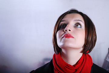 Image showing Portrait of a young woman wearing red scarf