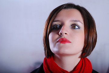 Image showing Portrait of a young woman wearing red scarf