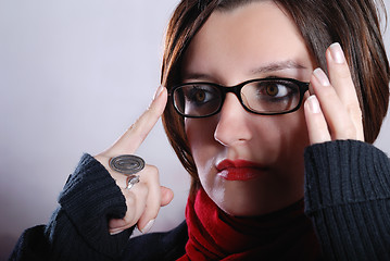 Image showing Portrait of a young wonam wearing red scarf