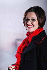 Image showing Portrait of a young wonam wearing red scarf