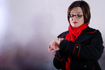 Image showing Portrait of a young wonam wearing red scarf