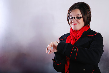 Image showing Portrait of a young wonam wearing red scarf