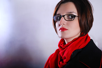 Image showing Portrait of a young wonam wearing red scarf