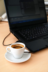 Image showing Morning coffee at the office