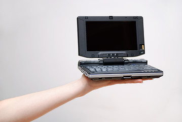 Image showing How snall a laptop can be
