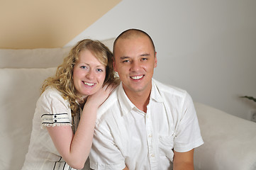 Image showing happy young couple smilling